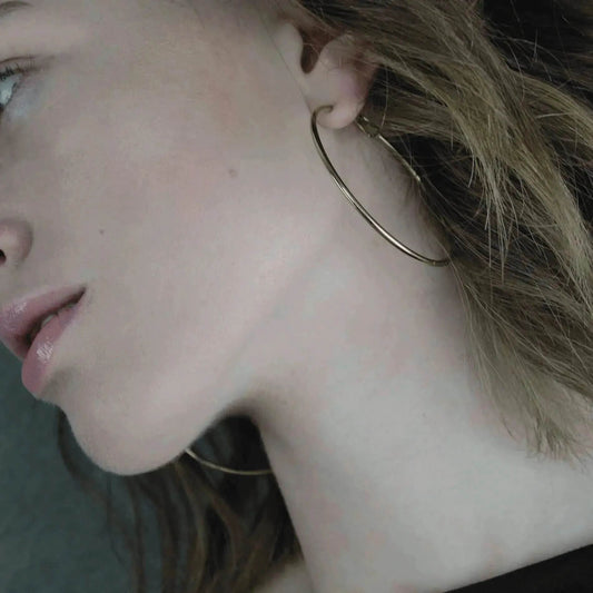 Wasserfester Creolen-Ohrring „Passion“. 18 Karat Gold/Platin. Dansk Copenhagen