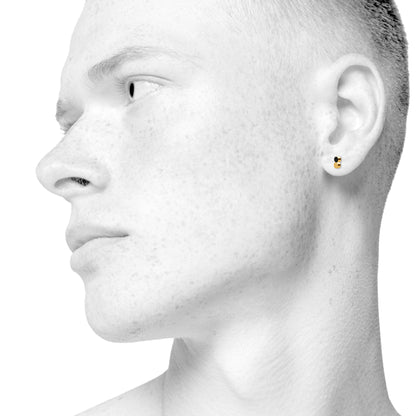 Sign Dotty nano earrings for him and her. Black and gold. Gold-plated sterling silver. Scherning Copenhagen